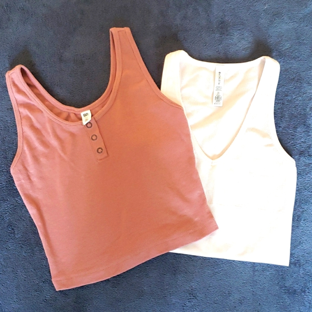 Two (2) cropped tops, sizes xx-small and x-small, by Athleta and BP.